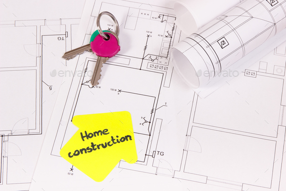 Home keys, house shape with text home construction and electrical diagrams, building home concept - Stock Photo - Images