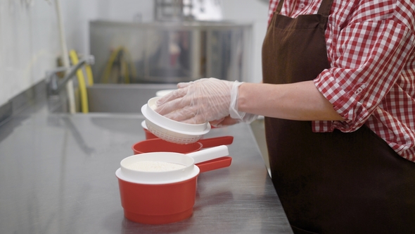 Plant Worker Shaping Fresh Cheese Curd Using Plastic Forming Sieve ...