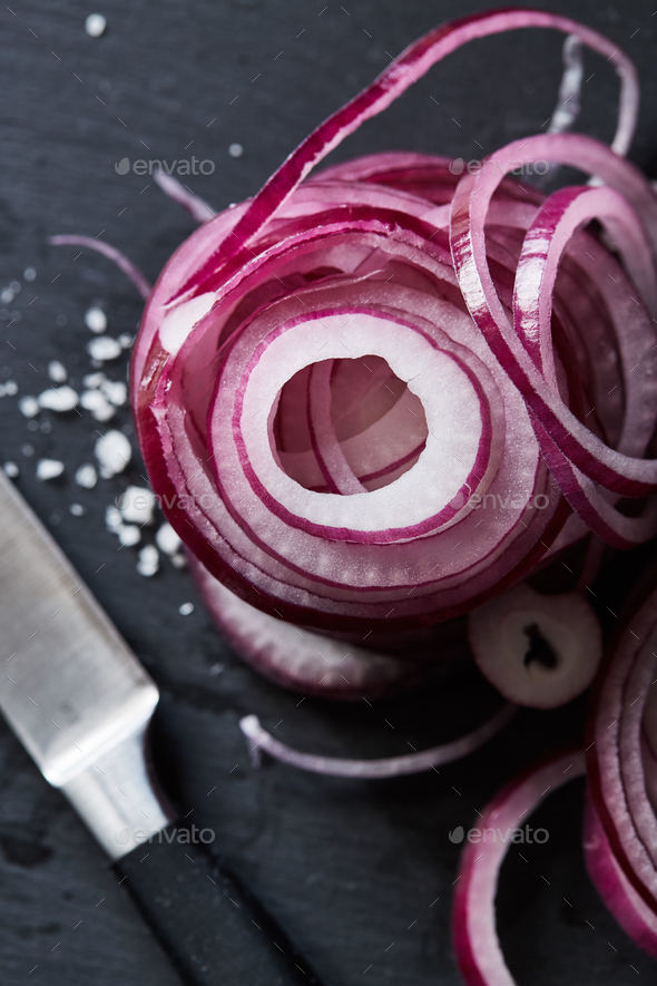 Sliced red spanish onion rings and sea salt Stock Photo by lenina11only