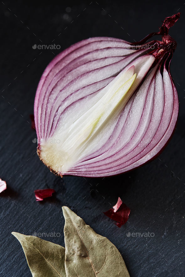 Sliced red spanish onion with bay leaf Stock Photo by lenina11only