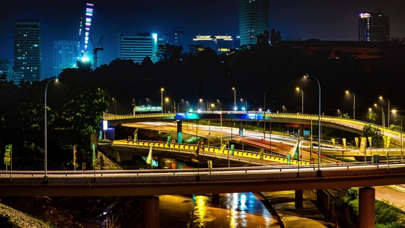 of Traffic on Freeway Interchange at Night in Kuala Lumpur Malaysia.