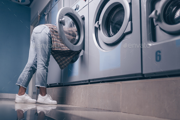 Young girl in the washing machine Stock Photo by AboutImages | PhotoDune