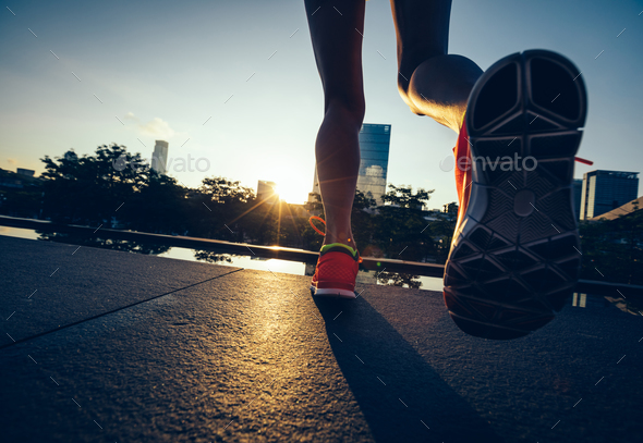 Running in sunrise city Stock Photo by lzf | PhotoDune