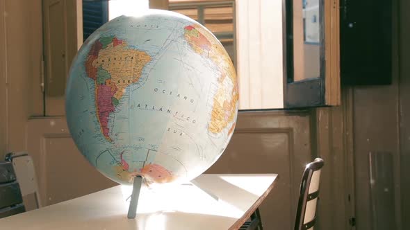 Terrestrial Globe Map in an Empty Classroom. Zoom Out. alt