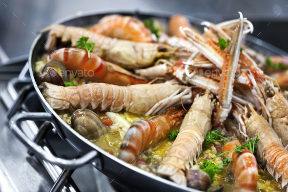 Scampi and paella Stock Photo by Jacques_Palut | PhotoDune