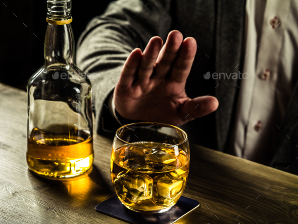 Drinking whiskey at night Stock Photo by alexbowmore | PhotoDune