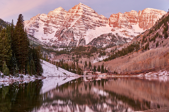 Maroon Bells and Maroon Lake at sunrise - Stock Photo - Images
