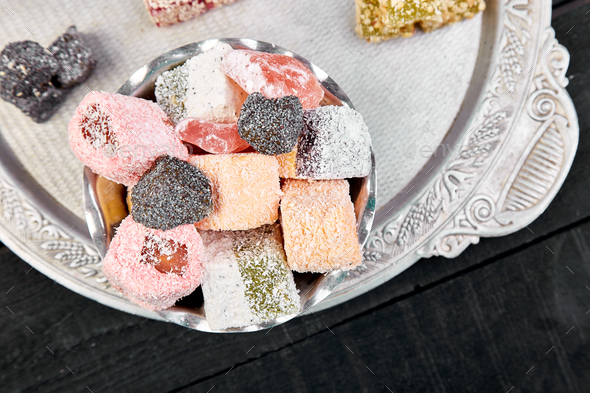 Set of various Turkish delight in bowl on metal tray - Stock Photo - Images