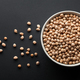 dry chickpeas in white bowl isolated on dark background. top view - PhotoDune Item for Sale