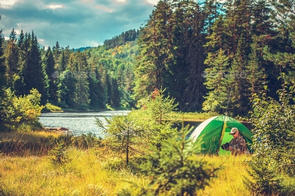 Survival Camping in the Wild Stock Photo by duallogic | PhotoDune