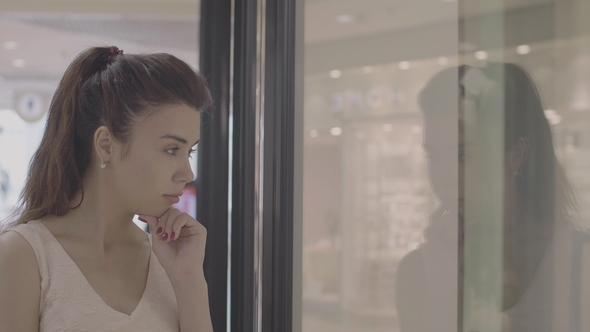 Beautiful Adult Girl Looking To Showcase of Store alt