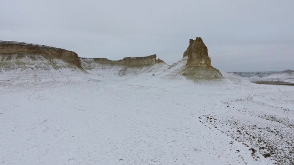 Amazing Aerial View of Snow-covering Ustyurt Sandy Mountains in Western Kazakhstan, Mangyshlak