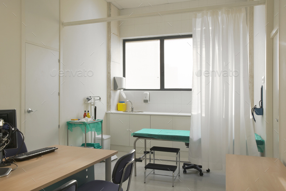 Hospital doctor consulting room. Healthcare equipment. Medical treatment equipment. Office Stock Photo by ABBPhoto
