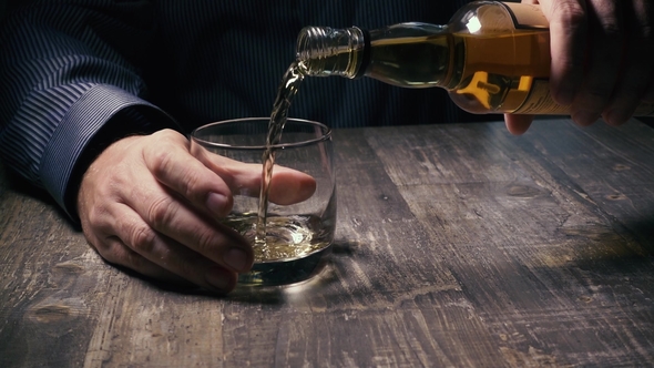 Man From the Bottle Pours Bourbon