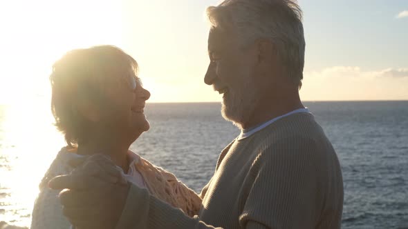 close up and portrait of two happy and active seniors or pensioners having fun and enjoying alt