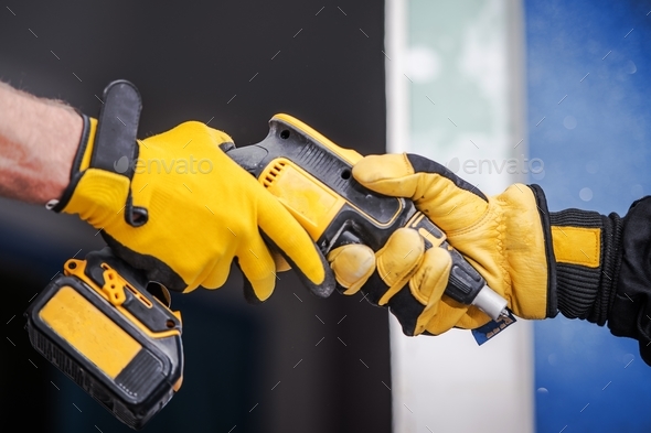 Sharing Construction Equipment - Stock Photo - Images