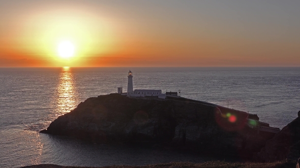 Sunset with Lens Flare at South Stack Lighthouse alt