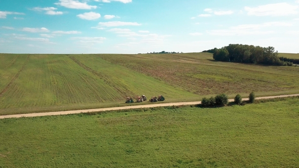 Drone Flies Over Agricultural Machinery
