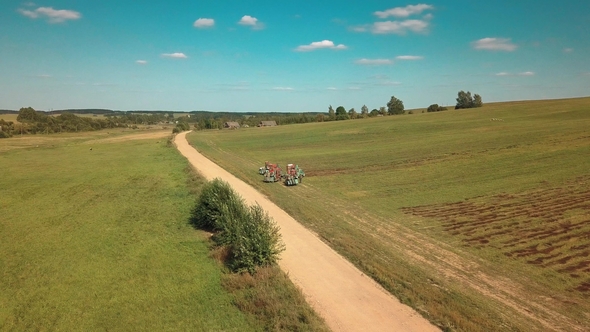 Drone Flies Over Agricultural Machinery