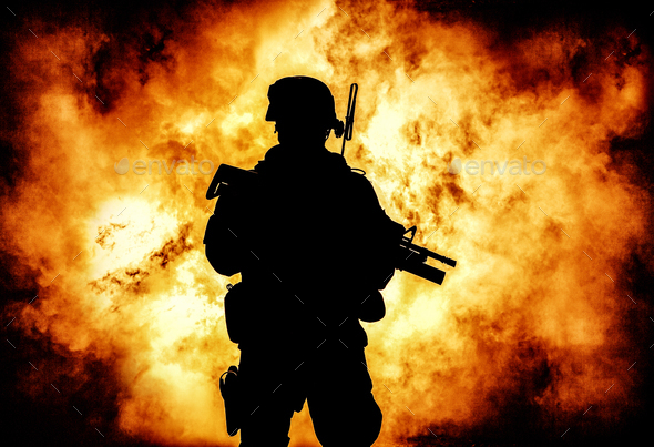 Soldiers silhouette on background of explosion - Stock Photo - Images