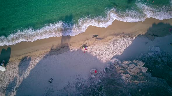 Beautiful Beach with Family Top Aerial View