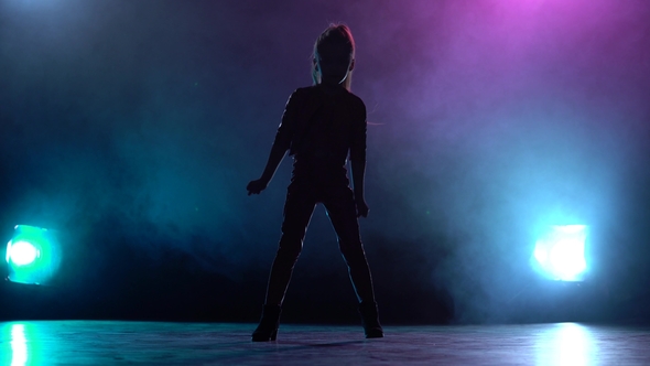 Baby Dances Jazz Funk. Multicolor Smoke Background. Silhouette. Light From Behind alt