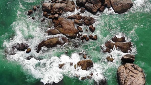 Aerial View of Ocean Waves Clashing on Rocky Coastline on By Drone Aerial Hikkaduwa Sri Lanka