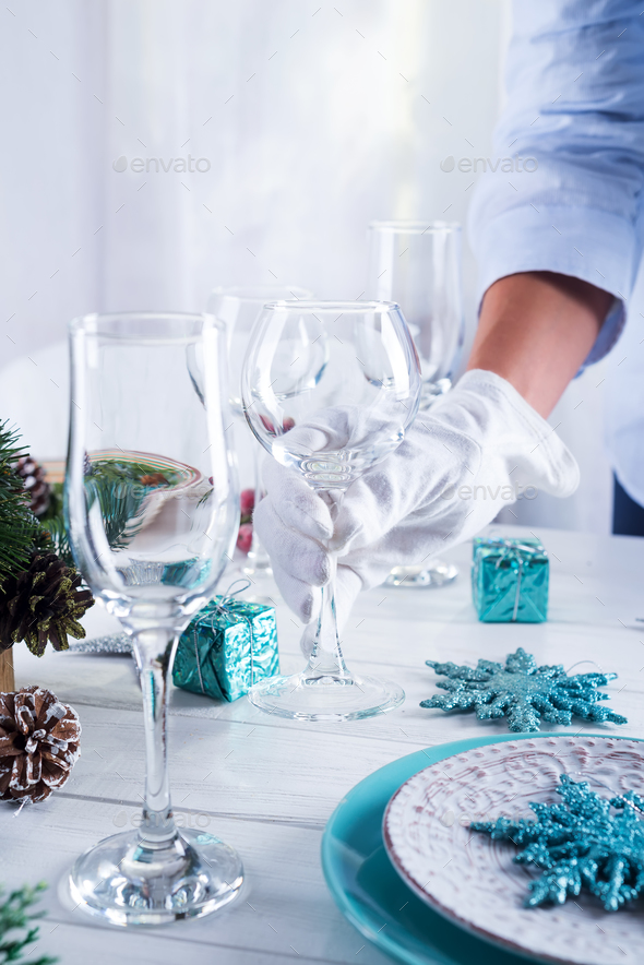 Beautiful table setting for the festive table Stock Photo by lyulkamazur