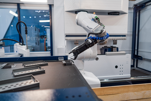 Robotic Arm modern industrial technology. Automated production c Stock Photo by cookelma