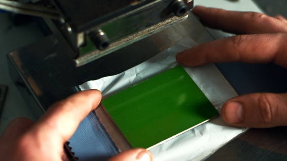 Leatherworker Stamping Leather Shoe Insole. Shoemaker Hands Branding Footwear alt