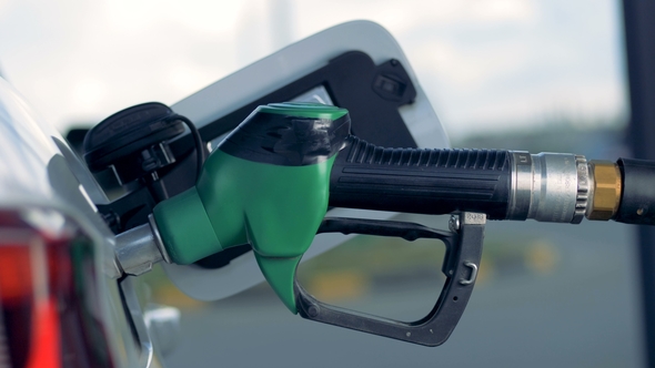 Gas Nozzle in a Car's Tank alt