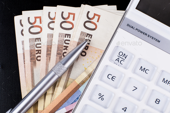 Calculatin Earnings - Stock Photo - Images