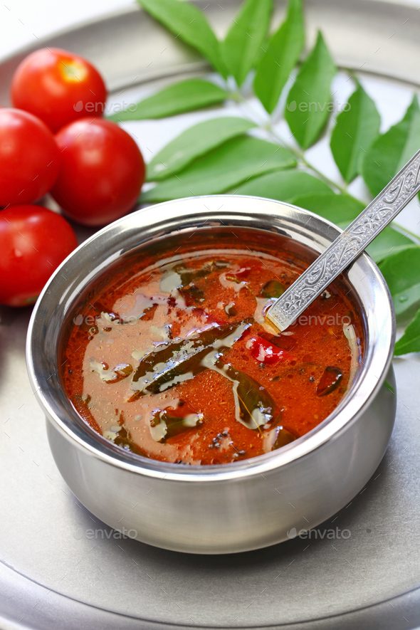 tomato rasam, kerala style tomato soup, south indian food Stock Photo by motghnit