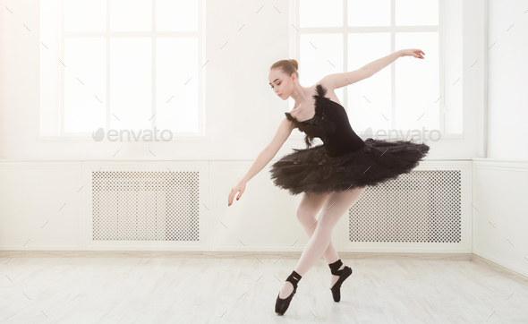 Beautiful graceful ballerina in black swan dress - Stock Photo - Images