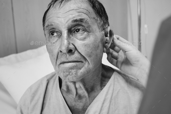 Old man wearing hearing aids Stock Photo by Rawpixel | PhotoDune