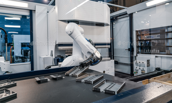 Robotic Arm modern industrial technology. Automated production c Stock Photo by cookelma