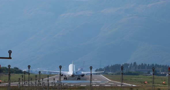 Airplane landing on airport Tivat in Montenegro