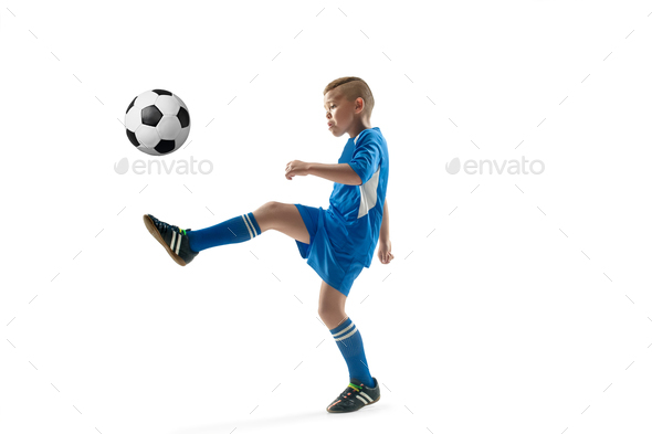 Young Boy With Soccer Ball Doing Flying Kick Stock Photo By Master1305