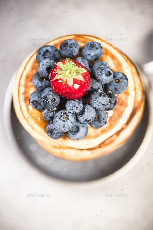 Blueberry and strawberry on pancakes Stock Photo by merc67 PhotoDune