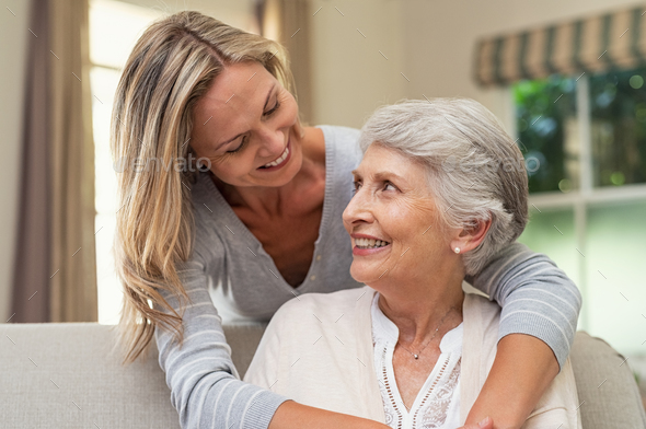 Woman embracing senior mother - Stock Photo - Images