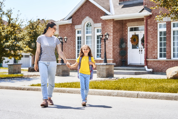 Parent and pupil go to school - Stock Photo - Images
