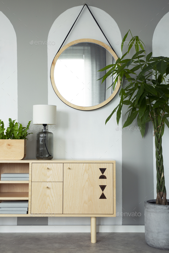 Round Mirror Above Wooden Cabinet With, Round Mirror Above Sideboard