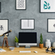 Telescope and desktop computer on wooden desk in grey workspace - $5.00 Telescope and desktop computer on wooden desk in grey workspace