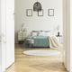 Real photo of white bedroom interior with round rug, king-size b - $5.00 Real photo of white bedroom interior with round rug, king-size b