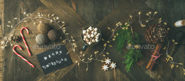 Flat-lay of greeting card, glittering toys, mug of hot chocolate, - Stock Photo - Images