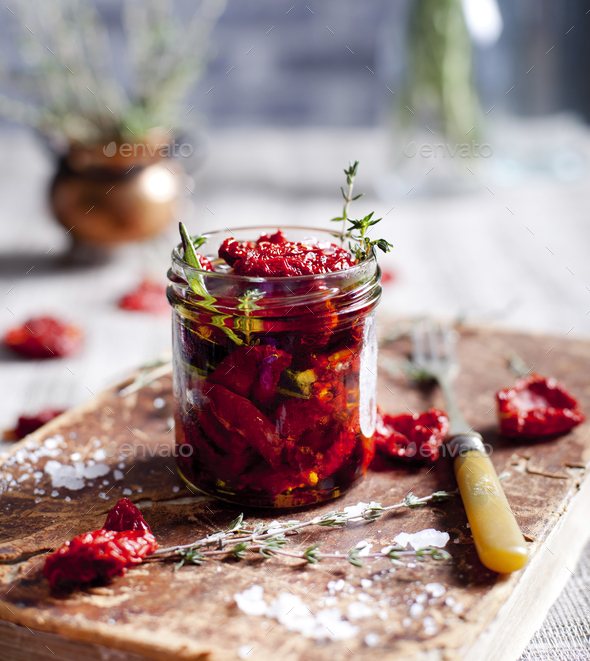 Sun Dried Tomatoes in Glass Jar Stock Photo by annapustynnikova PhotoDune
