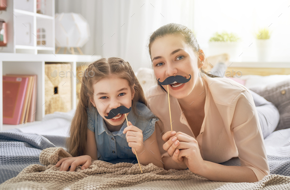 mother and daughter playing - Stock Photo - Images