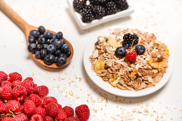 Healthy breakfast super food cereal concept with fresh fruits isolated on white