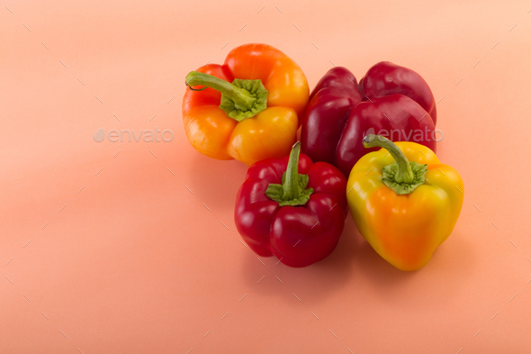 Sweet bellpepper on a colored background. Studio light. Top view - Stock Photo - Images