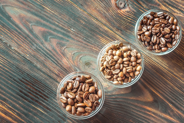 Bowls of different types of coffee beans Stock Photo by Alex9500 | PhotoDune